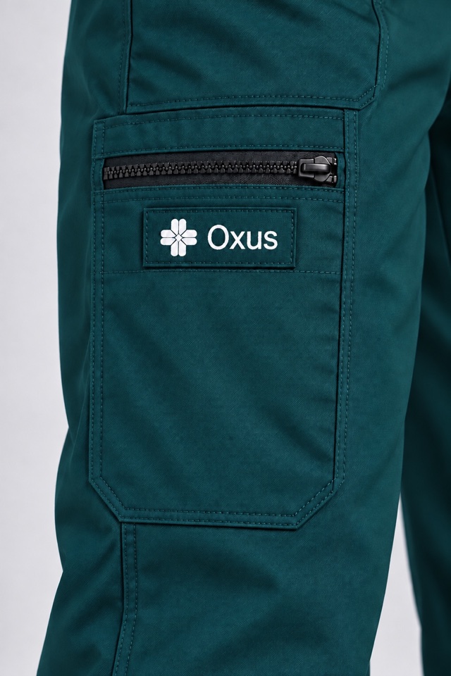 Close-up of the Oxus cargo badge and zipped pocket